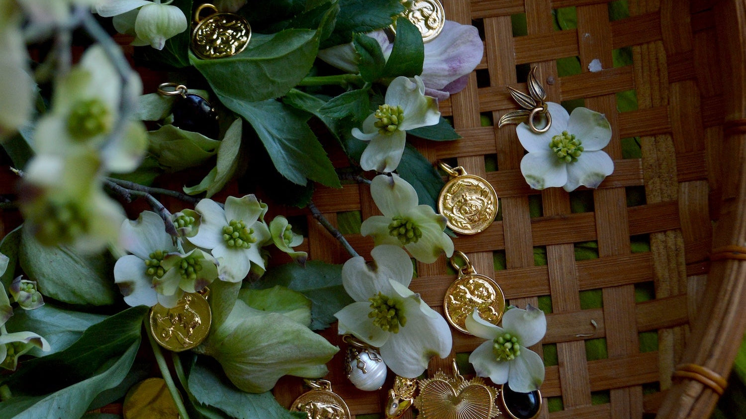 flowers and charms in a wicker basket