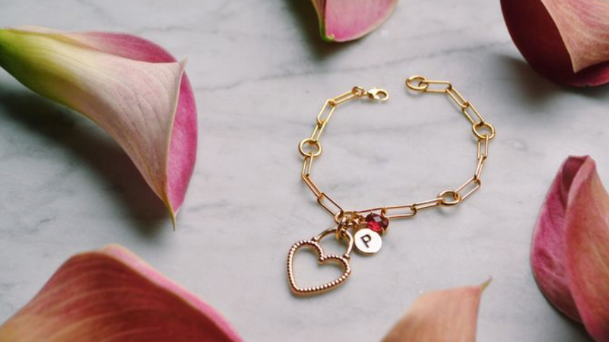 heart charm bracelet with flowers