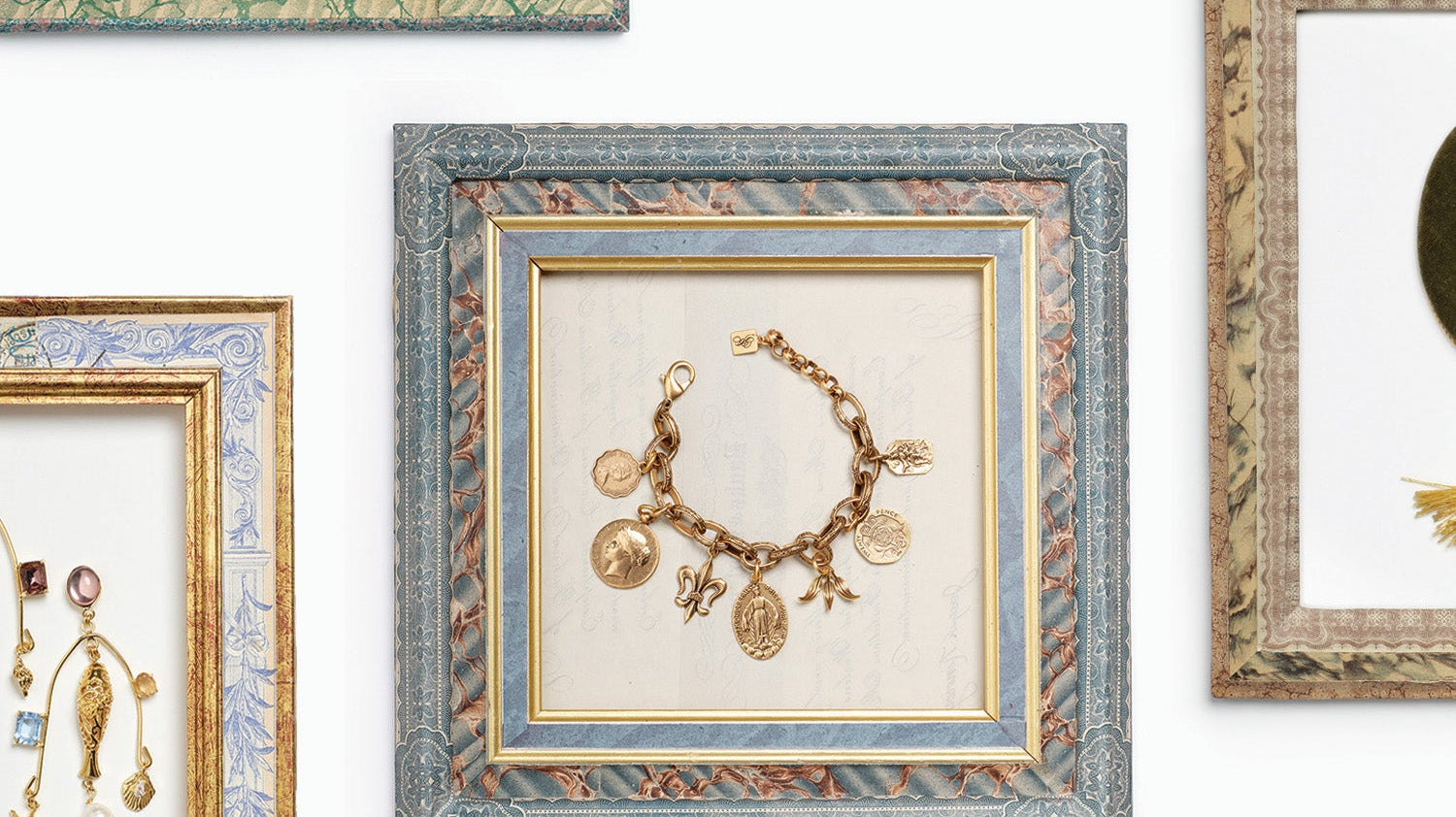 Gold jewlery in handmade frames