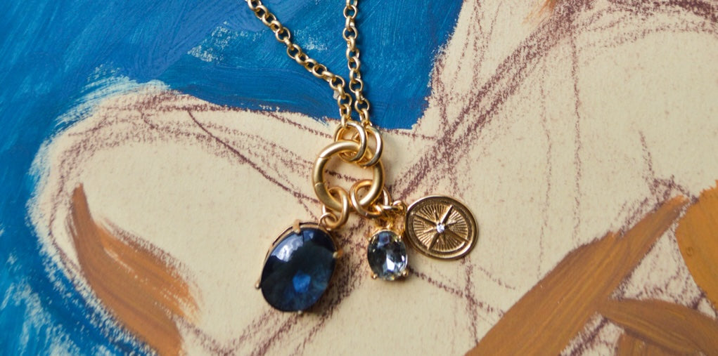 a necklace on a painted watercolor background 