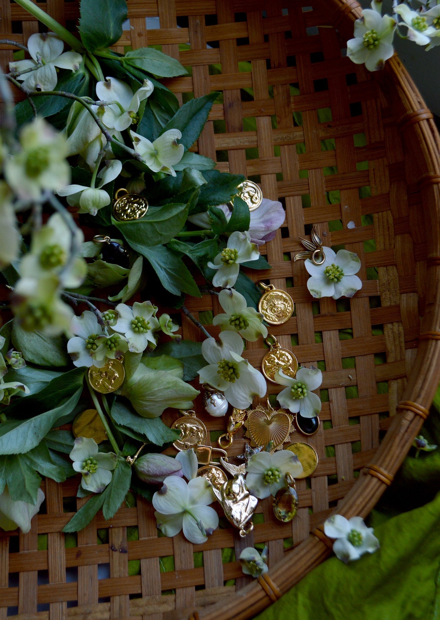 flowers and charms in a wicker basket