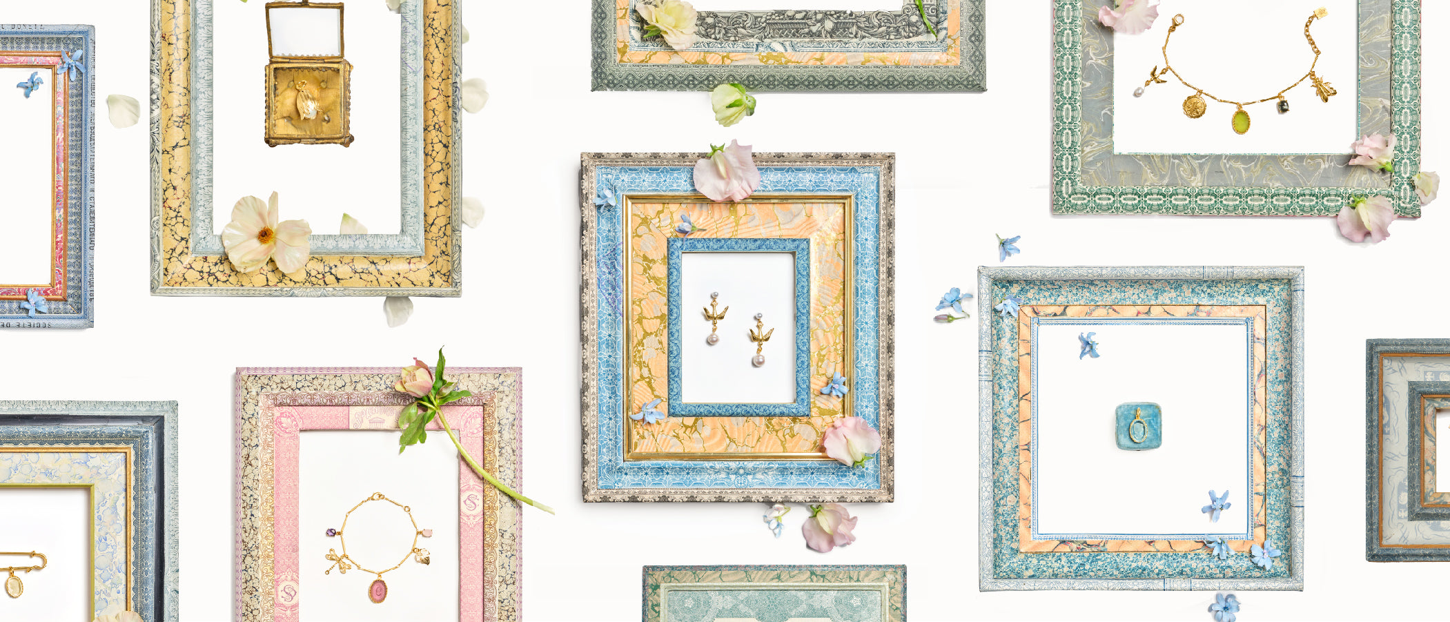 Gold jewlery in handmade colorful frames 